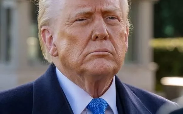 Washington Dc, United States, March 21 2025:President Donald Trump stops to speak with media before boarding Marine 1