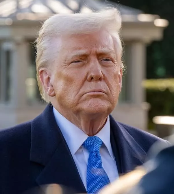 Washington Dc, United States, March 21 2025:President Donald Trump stops to speak with media before boarding Marine 1